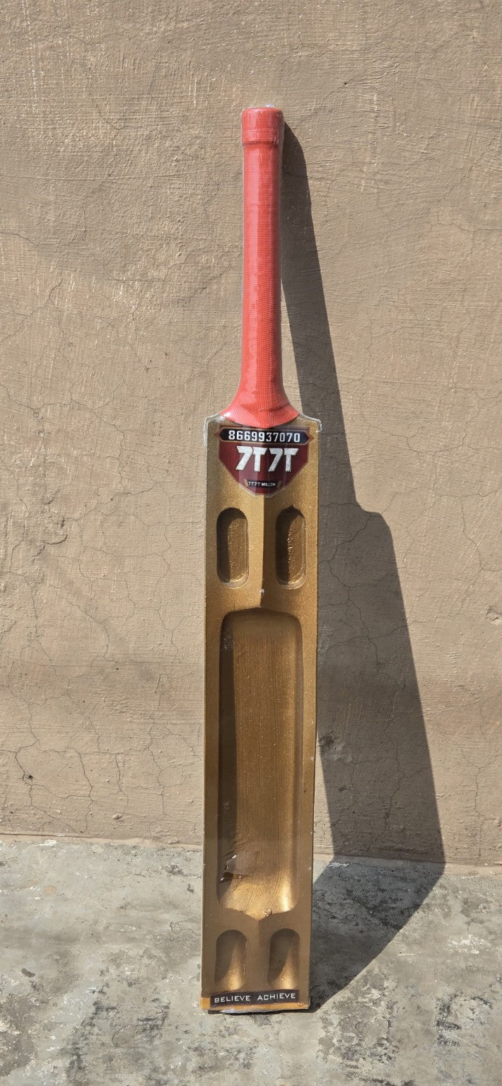 7T 7T Million gold scoop cricket bat with red handle