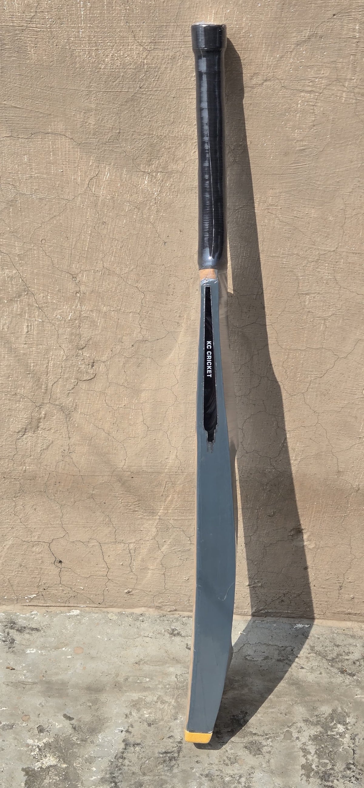 Detail view of the No Mercy KC Destroyer scoop cricket bat
